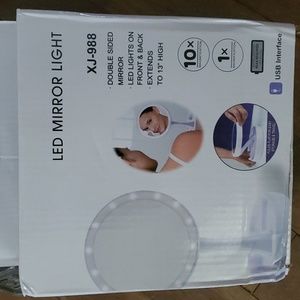 New in box LED Makeup mirror.